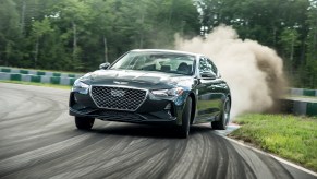 2019 Genesis G70 sedan drifting around a racetrack