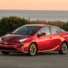 a red 2016 Toyota Prius parked