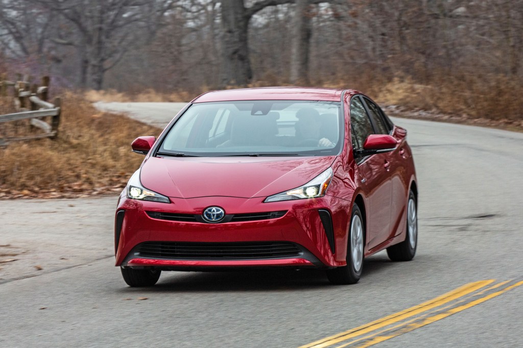 Front view of a red 2019 Toyota Prius.