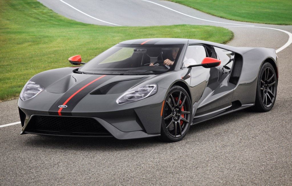 A gray 2019 Ford GT speeding down a race track.