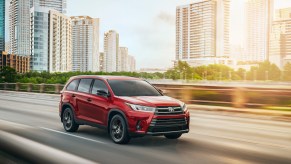 2019 Toyota Highlander driving down the highway