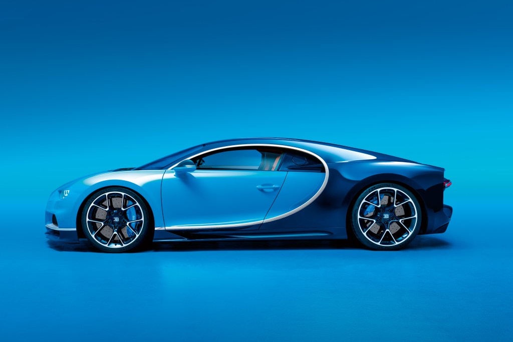 The side view of a light-blue-and-dark-blue Bugatti Chiron