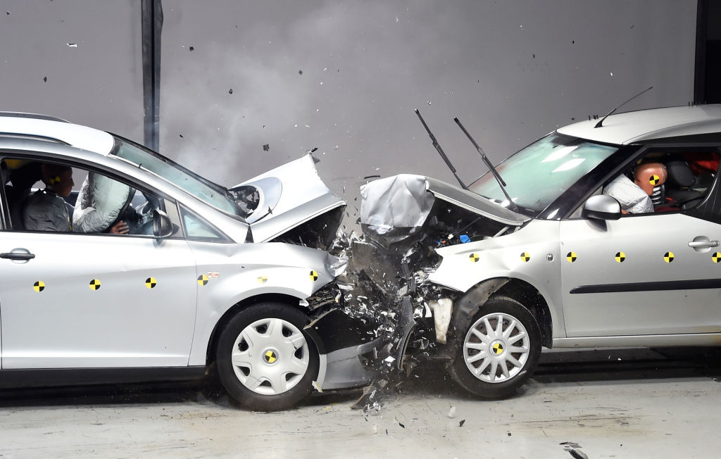 Two cars crash into each other in an IIHS or NHTSA crash test rating scenario to earn an five-star crash rating or less.