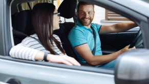 Driver and passenger discuss car etiquette rules
