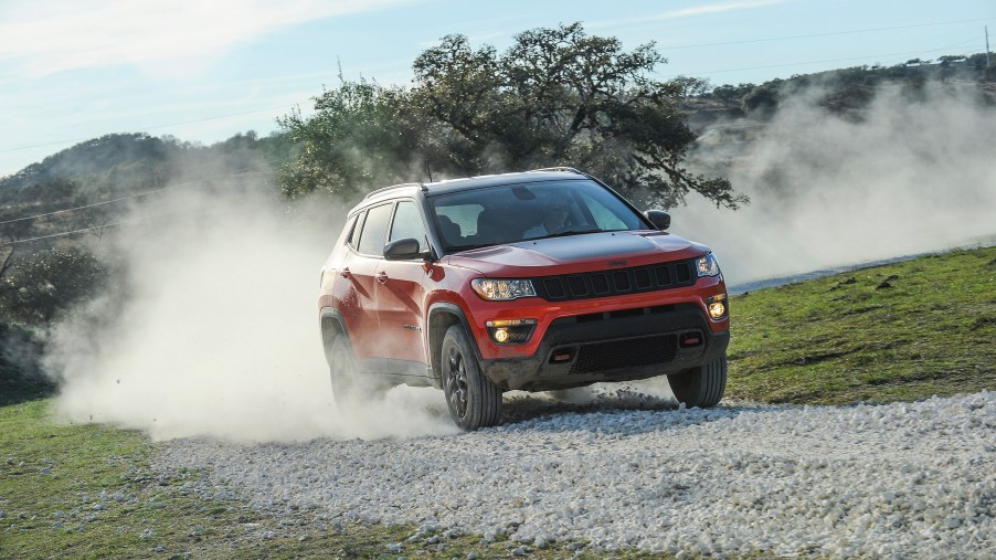 2019 Jeep Compass driving through sand