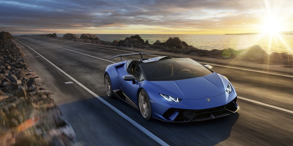 Lamborghini Huracan Performante Spyder driving down a coastal road