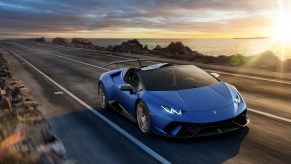 Lamborghini Huracan Performante Spyder driving down a coastal road