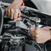 Mechanic-fixing-a-car-at-home-maintenance