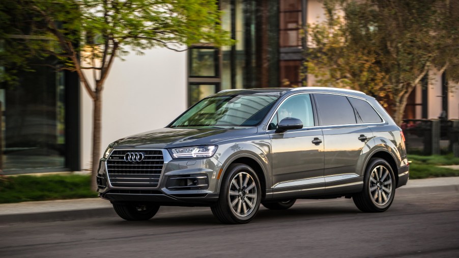 A grey 2017 Audi Q7 parked curbside.