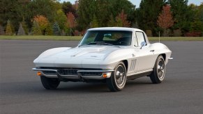 A white 1966 Chevy Corvette shows off its post-C1 C2 front-end styling.