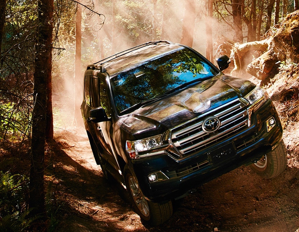 2019 Toyota Land Cruiser off-roading over rocky trail