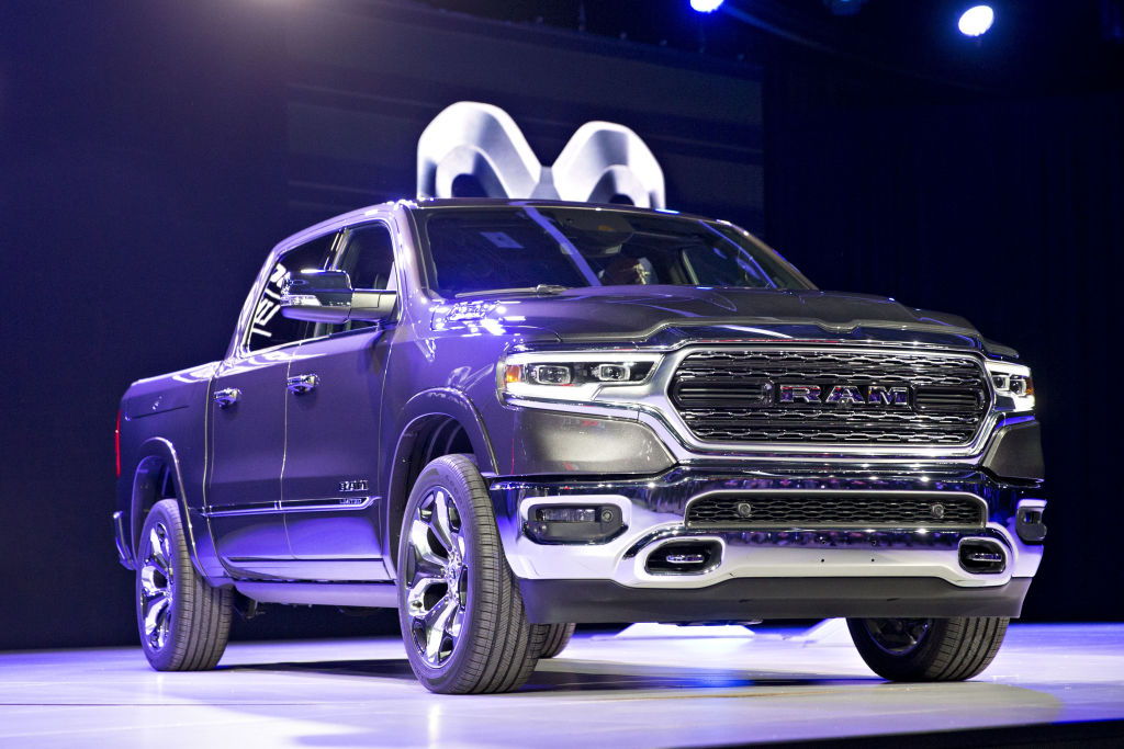 A 2019 Dodge Ram pickup truck on display at an auto event.