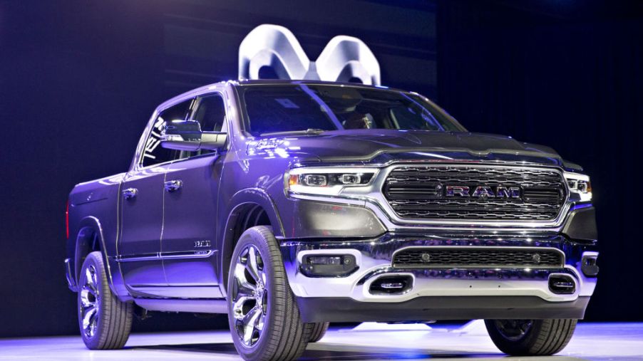A 2019 Dodge Ram pickup truck on display at an auto event.