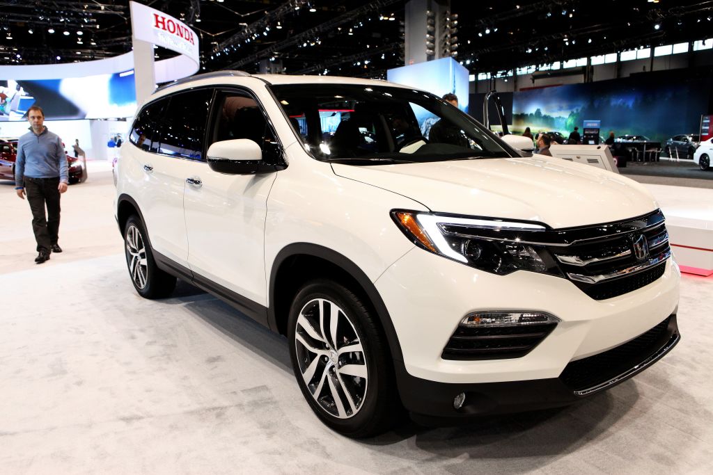 Honda's largest crossover, the Pilot on display at an auto show.