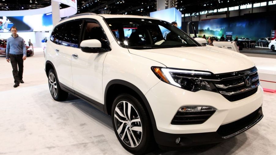 Honda's largest crossover, the Pilot on display at an auto show.