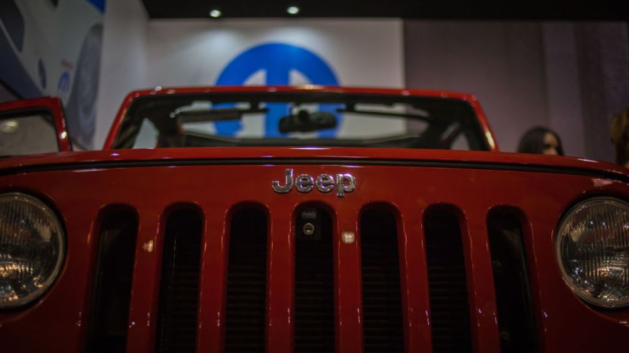 The Jeep truck logo on display at the International Motor Show Bogota