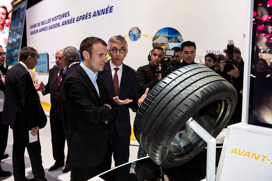 Former Economy Minister Emmanuel Macron Visits 'Mondial De L'Automobile' - Paris Motorshow 2016