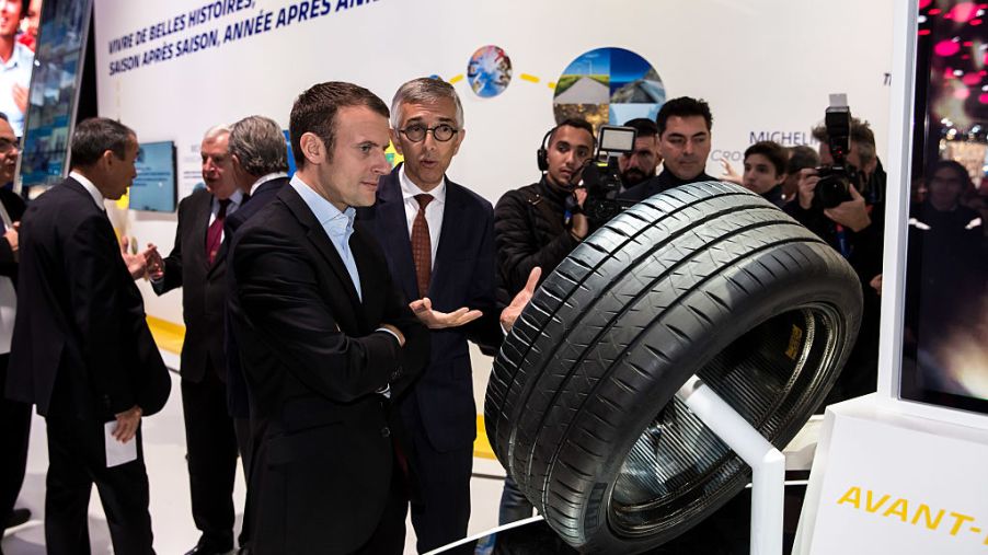 Former Economy Minister Emmanuel Macron Visits 'Mondial De L'Automobile' - Paris Motorshow 2016