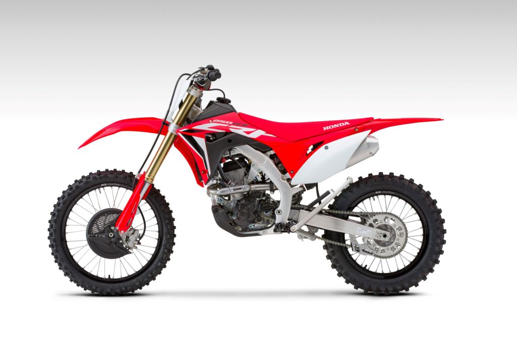 Red-and-white 2020 Honda CRF250RX side view
