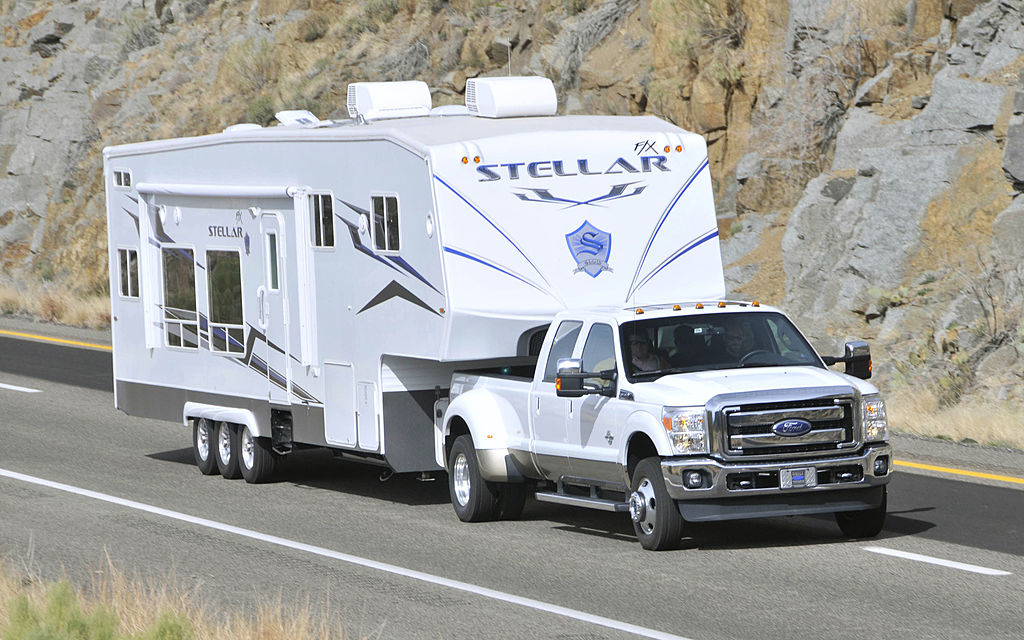 a 2011 Ford F-350 towing a trailer proves to be one of the least reliable 2011 pickup trucks according to Consumer Reports