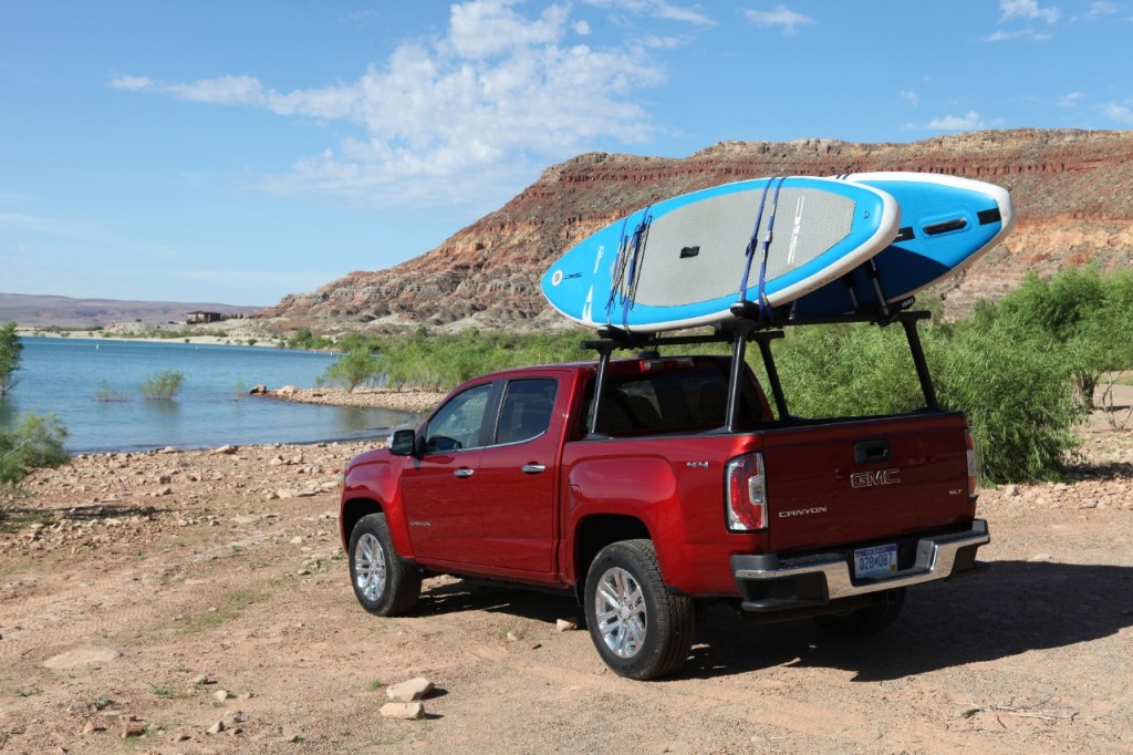A 2019 GMC Canyon carrying standup paddle boards