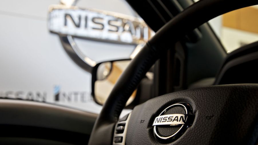 A picture from the inside of a Nissan Titan showing the steering wheel.