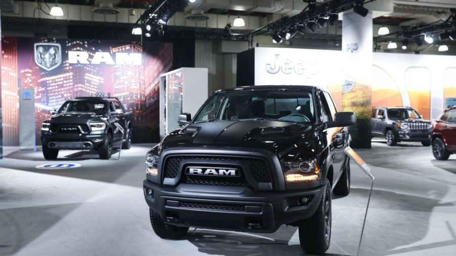 A 2020 Ram 1500 truck on display at an auto show.