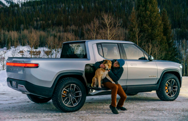 2020 Rivian R1T parked at camping site