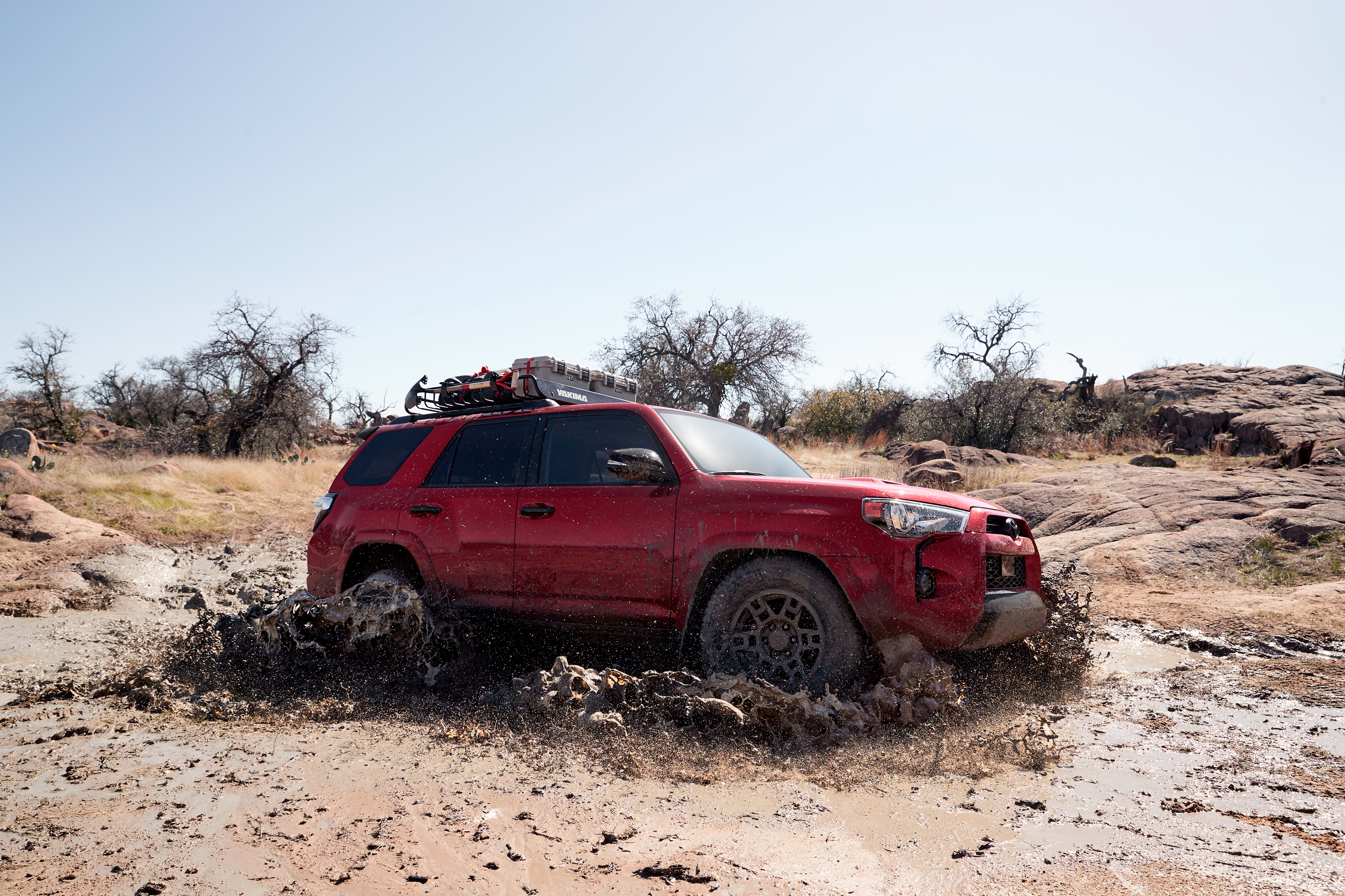 2020 Toyota 4Runner Venture Edition driving through mud
