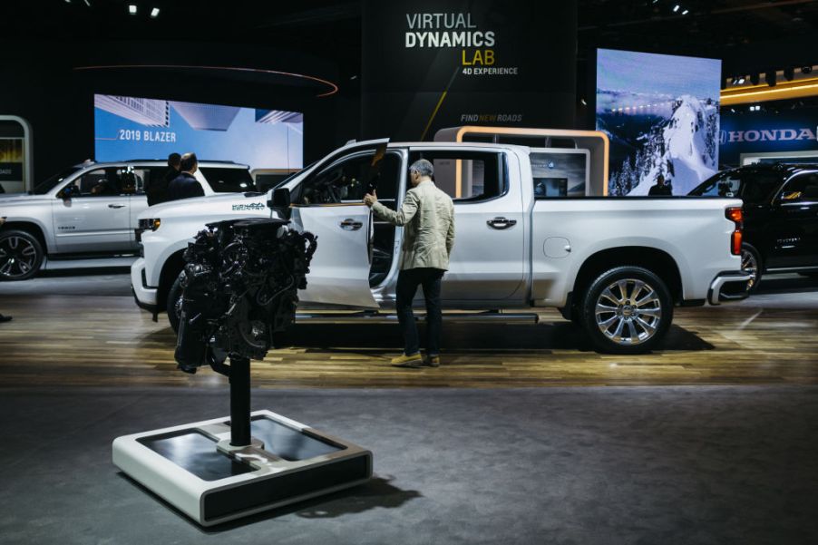 An attendee views the GM Chevrolet 2020 Silverado HD High Country truck