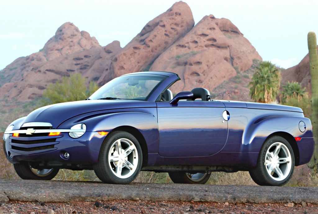 A blue 2003 Chevrolet SSR in the mountains.