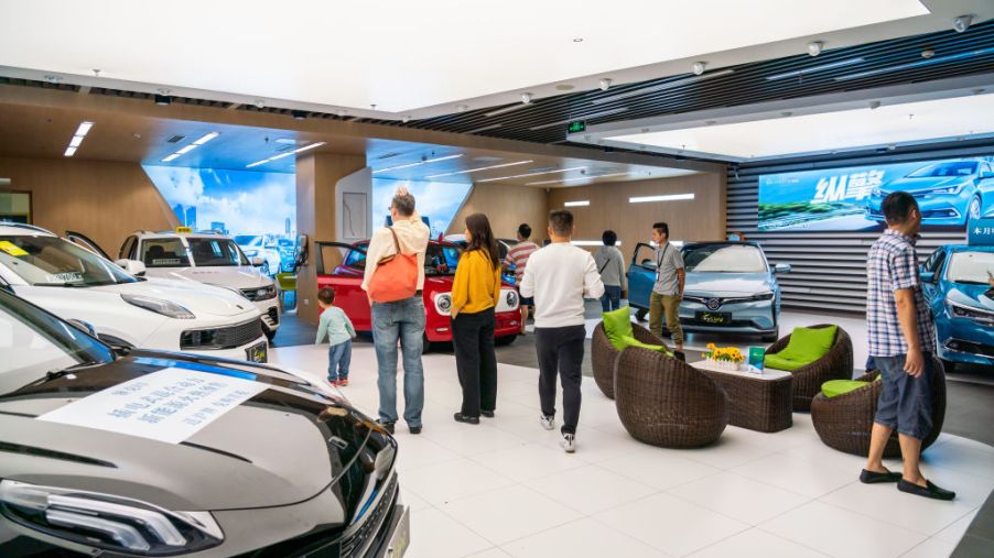 Customers visits an electric and hybrid vehicles store in Shanghai