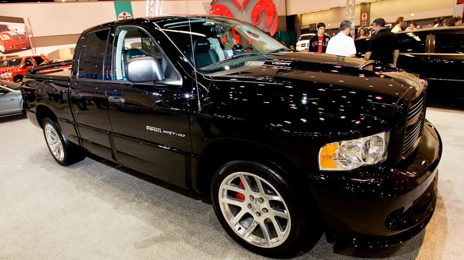A black Dodge Ram SRT-10 in a garage.