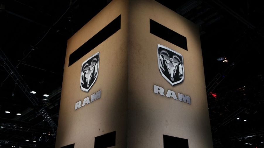 Two Dodge Ram banners hung up at an auto show.