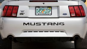 Back of a Ford Mustang with a Florida license plate.