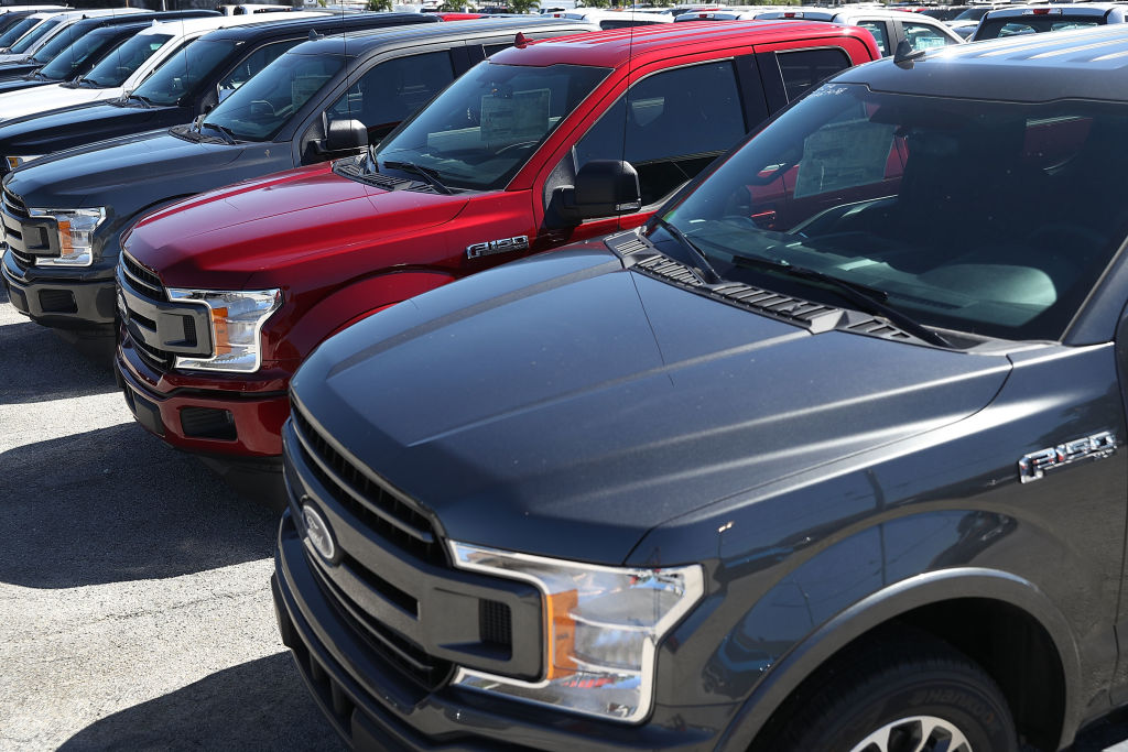 A lineup of Ford F-150 trucks.