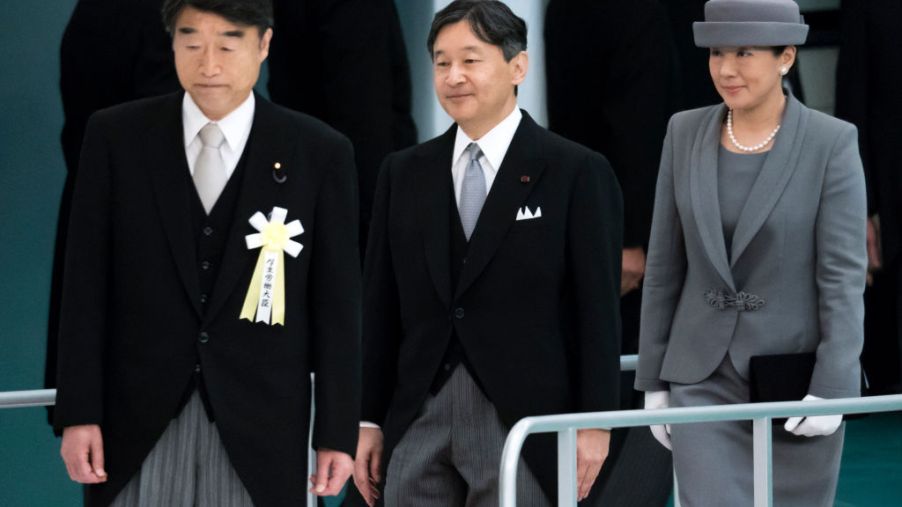 Japan's Emperor Naruhito and Empress Masako arrive for a memorial service marking the 74th anniversary of Japan's surrender in World War II