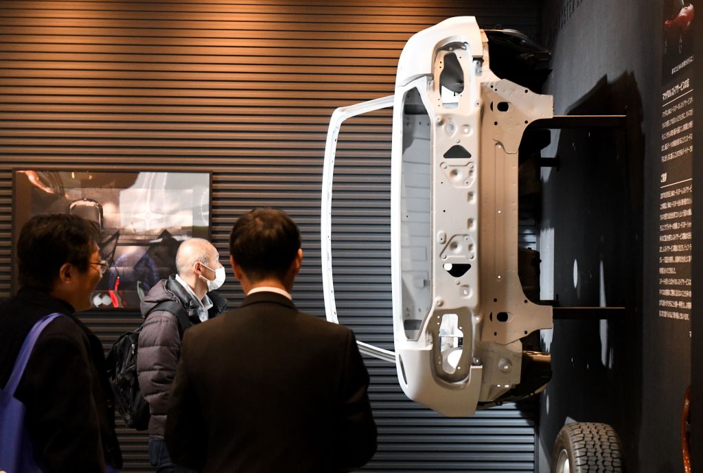 The chassis of the first generation Mazda Roadster is displayed at the Mazda booth's restore section of the Tokyo Auto Salon