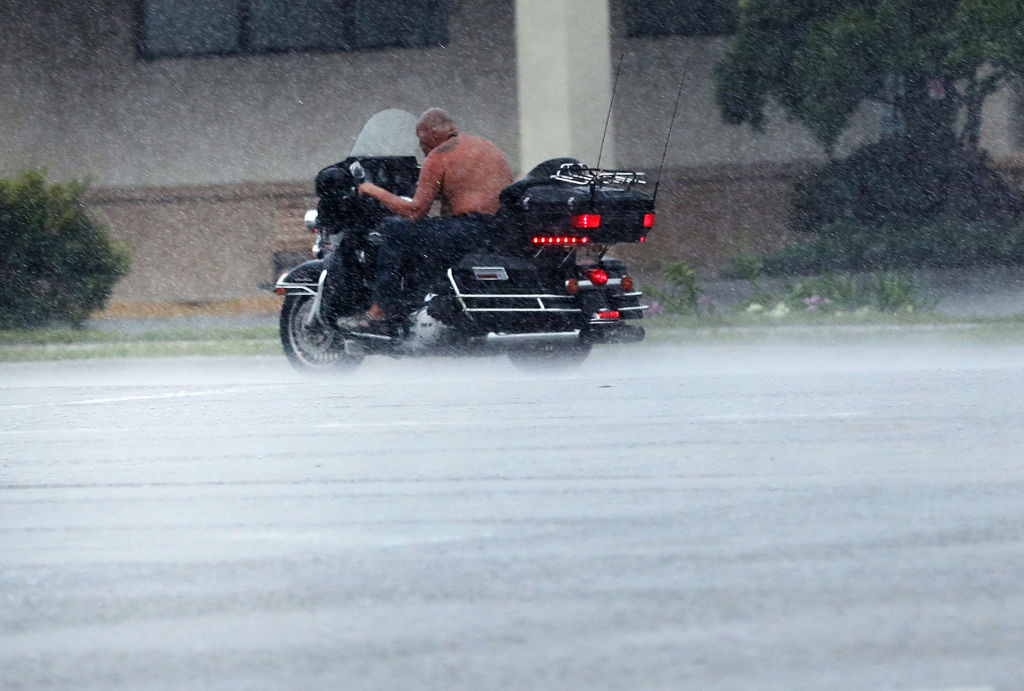A motorcycle driver in the rain