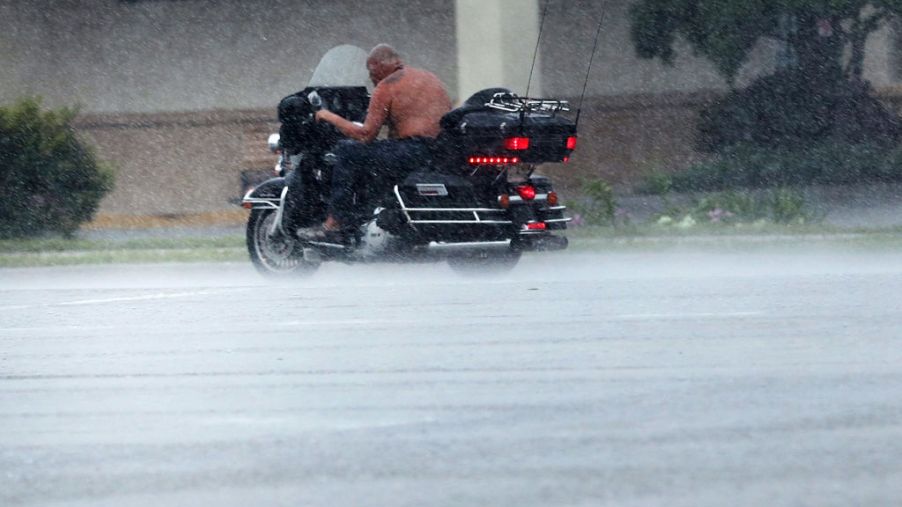 A motorcycle driver in the rain