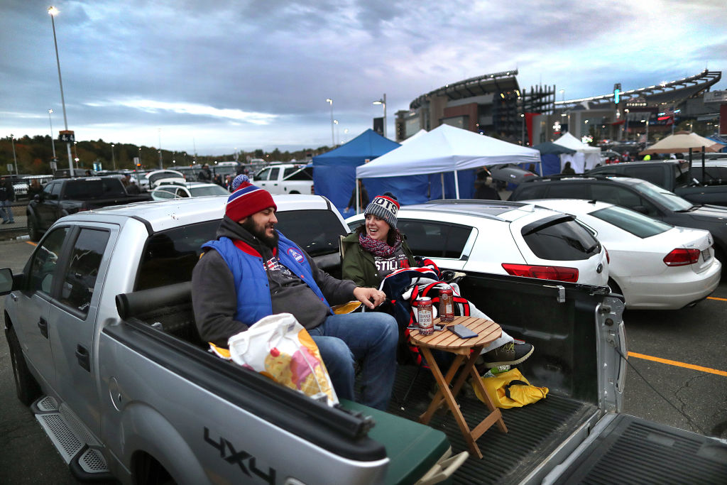Tailgaters Brian Kovalski and his wife Christina tailgate in their pickup truck