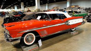 A red 1958 Pontiac Bonneville on display.