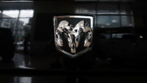 A Ram truck logo on a black truck