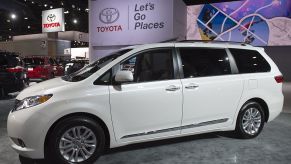 A brand new white Toyota Sienna on display