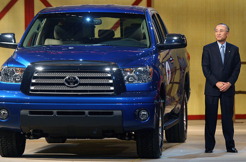 Toyota President Katsuaki Watanabe stands beside a new 2007 Toyota Tundra pickup truck