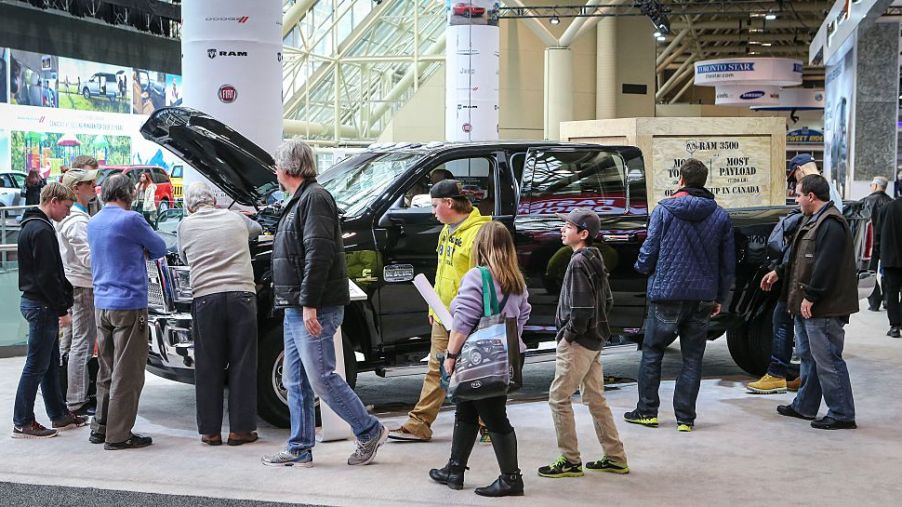 Autoshow patrons check out the $83,068 2015 Ram 3500 Laramie Longhorn Crew Cab at the 2015 edition