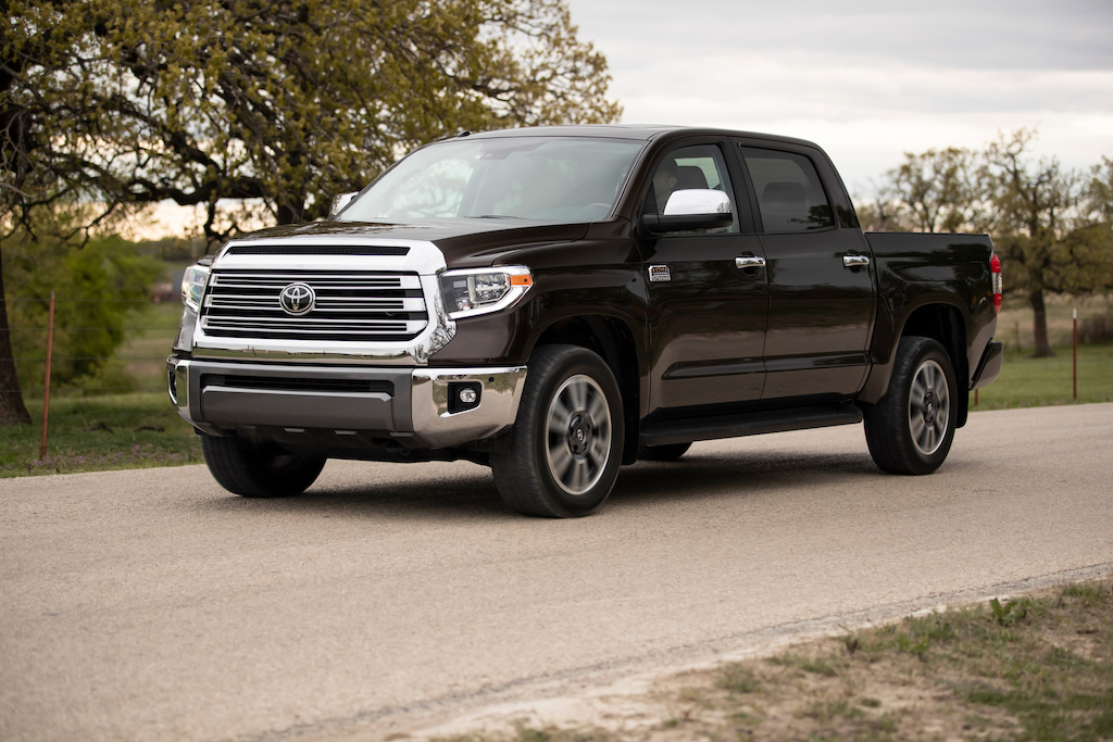 The 2019 Toyota Tundra drives on a country road