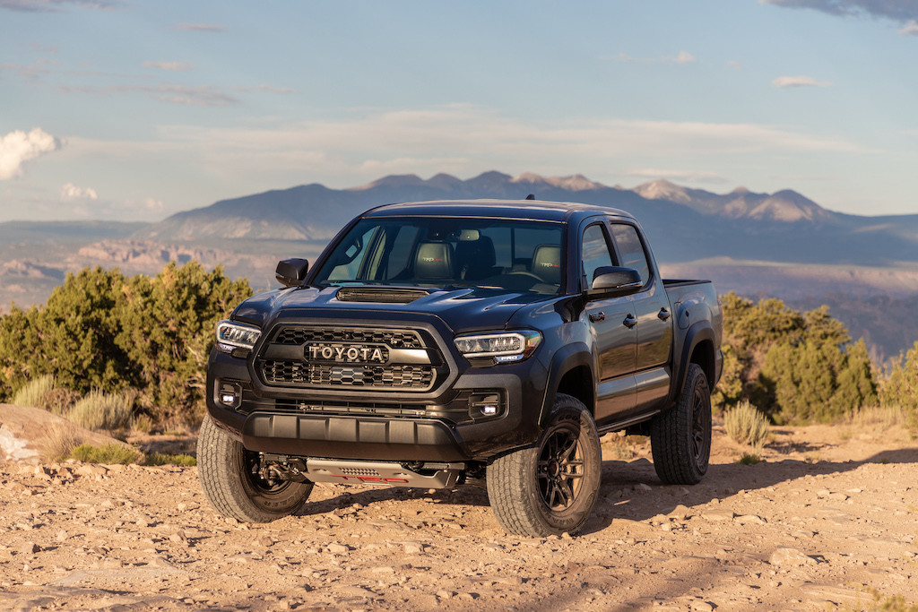 2020 Toyota Tacoma TRD parked in sand on a mountain top