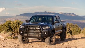 2020 Toyota Tacoma TRD parked in sand on a mountain top
