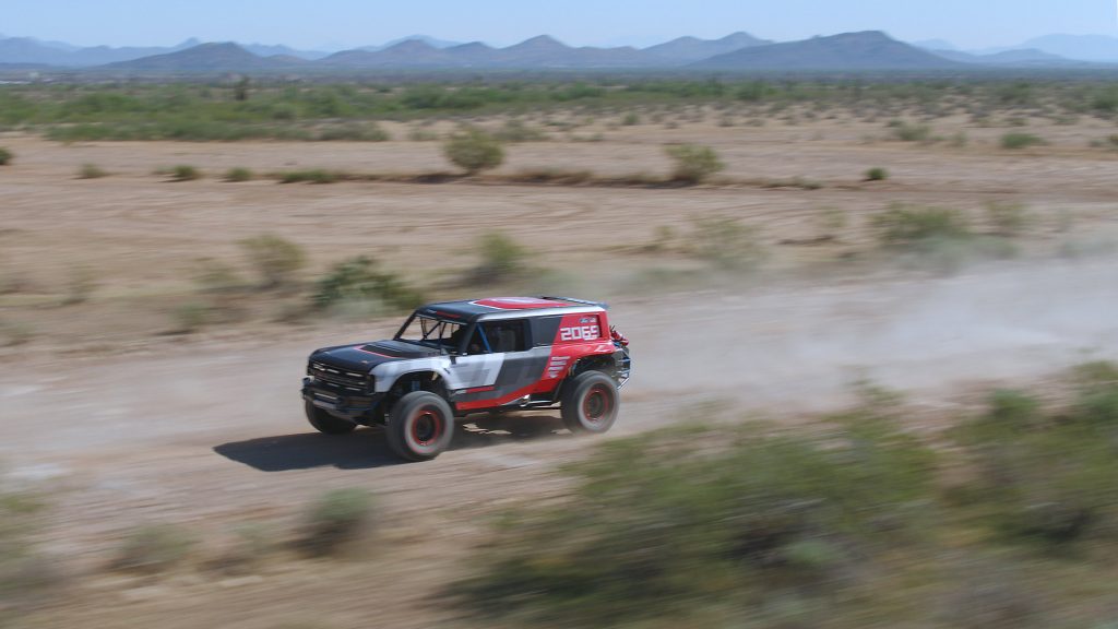 Ford Bronco R race prototype racing through sand